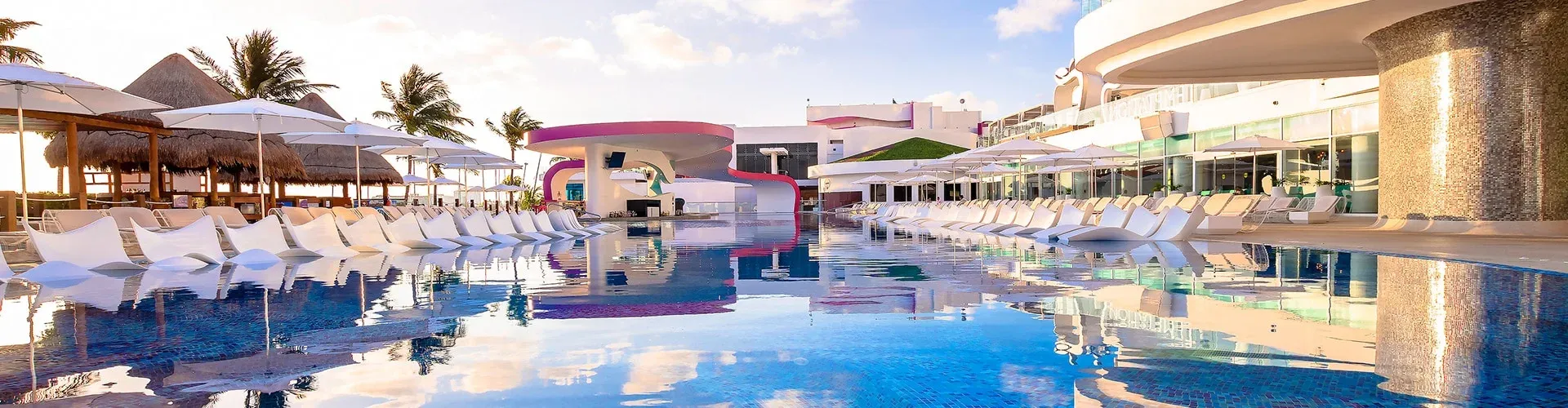 Sexy Pool and poolside lounge chairs at Temptation Cancun Resort